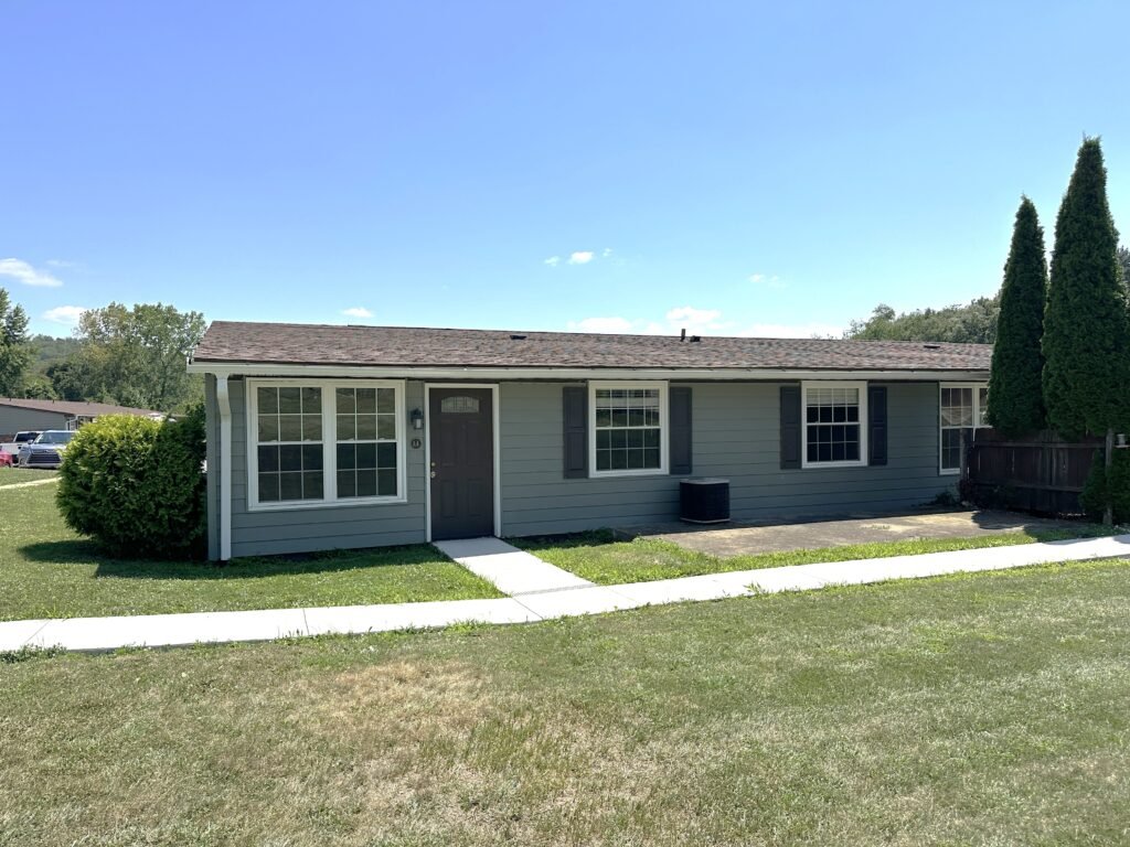 Two bedroom Pine Valley Patio Home apartment at Country Club Hills in Steubenville, front exterior view with yard