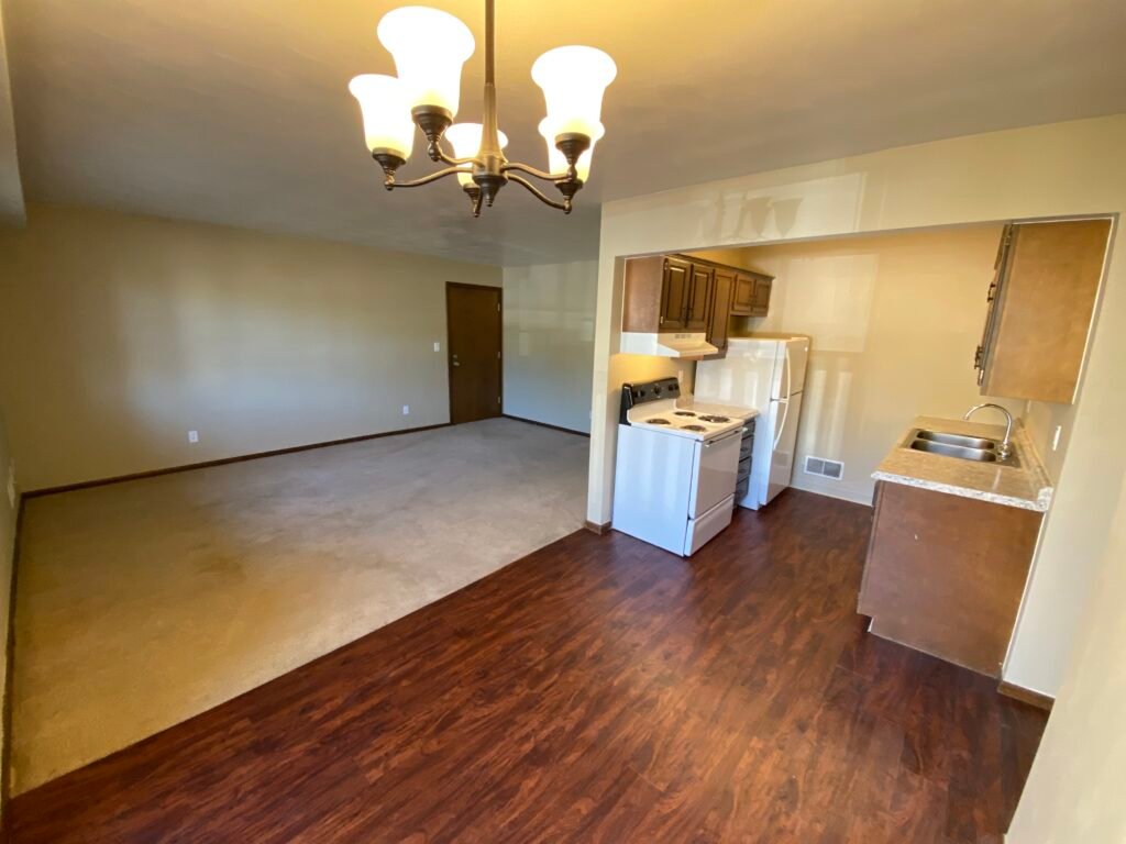 Two-bedroom Garden Apartment at Country Club Hills, Steubenville, dining area showing open view into kitchen and living room.