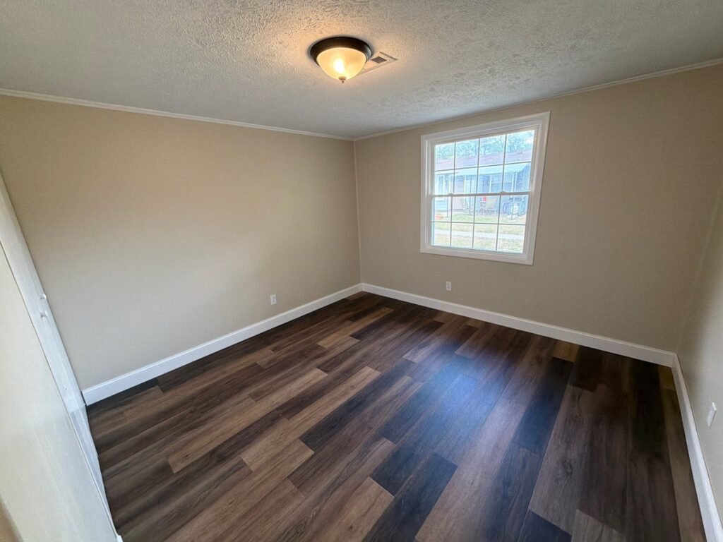 First view of the bedroom in a one-bedroom Patio Home at Country Club Hills, Steubenville.