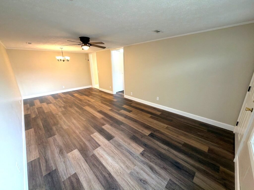 Perspective from the living room in a one-bedroom Patio Home apartment at Country Club Hills, Steubenville, showing open layout
