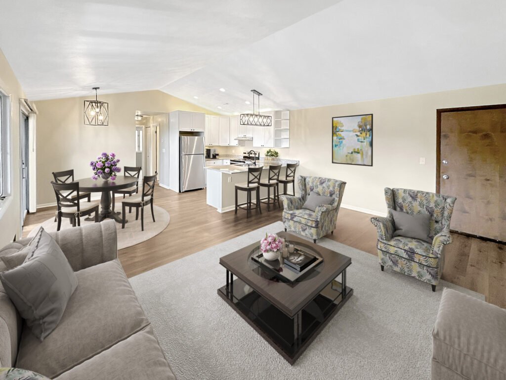 Spacious Penthouse Suite living room at Country Club Hills, Steubenville, staged with modern furniture and décor.