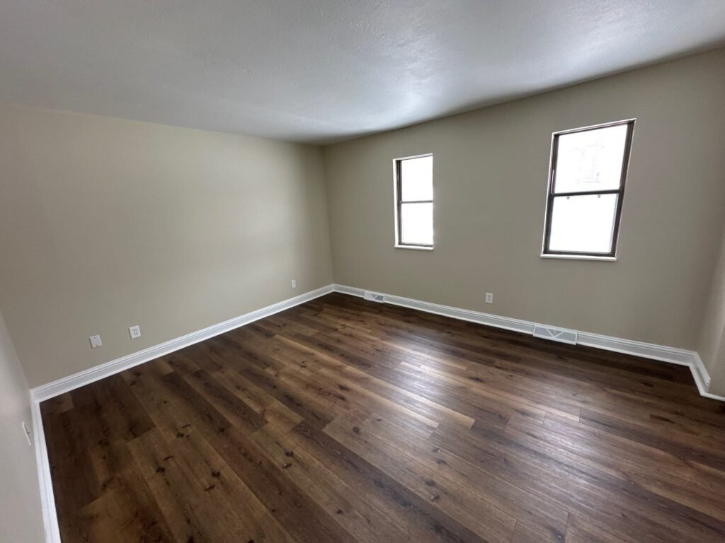 Spacious main bedroom in a Scioto Townhouse at Country Club Hills in Steubenville, first view