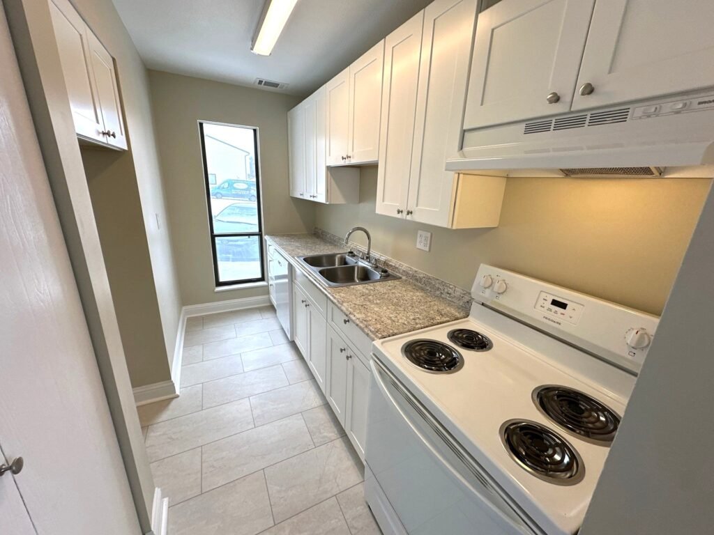 Modern kitchen in a Scioto Townhouse at Country Club Hills in Steubenville with appliances and cabinetry
